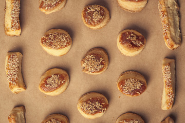 Fresh homemade salty scones with cheese and sesame