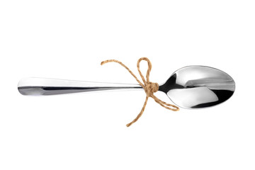 spoon tied with a ribbon isolated on white background