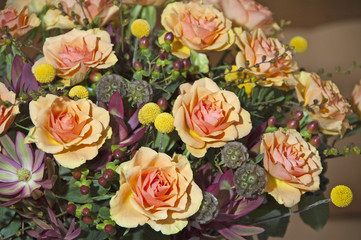 Bouquet with orange roses in vase