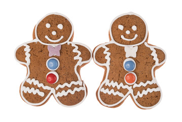 Two Christmas gingerbread men isolated on a white background