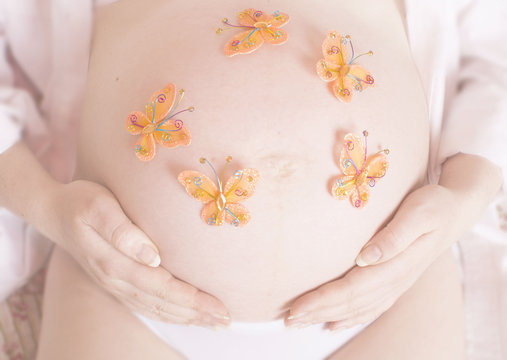Belly of pregnant woman closeup