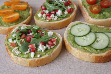 Mixed green sourdough open face sandwiches toast,toning
