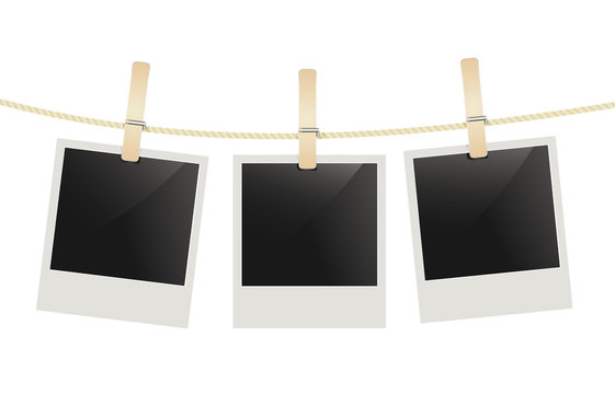 photo frames hanging on a rope with clothespins. vector