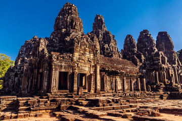 Fototapeta na wymiar Statue Bayon Temple Angkor Thom, Cambodia. Ancient Khmer archite
