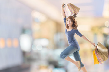 Cheerful shopping woman