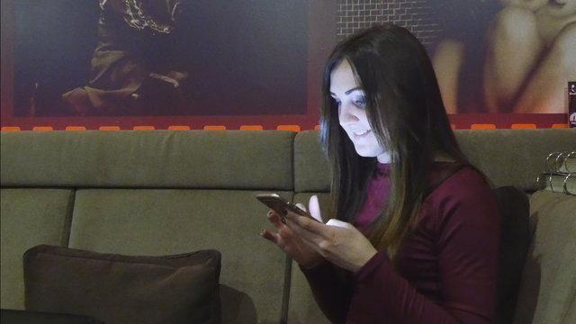 Woman use smartphone in cafe