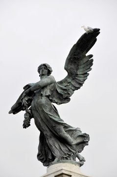 architecture of the city, a monument to an angel on a bridge in Rome, Italy near the Vatican
