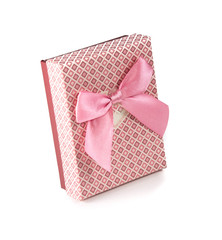 Pink gift box with ribbon bow on white background