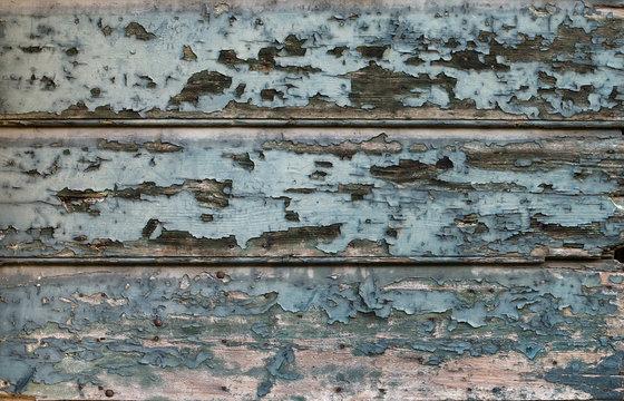 Old painted cracked blue wooden texture. Vintage rustic style. Natural surface, background and wallpaper