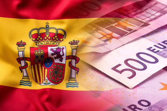 National flag of spain and euro banknote - concept. Euro coins. Euro money. Euro currency