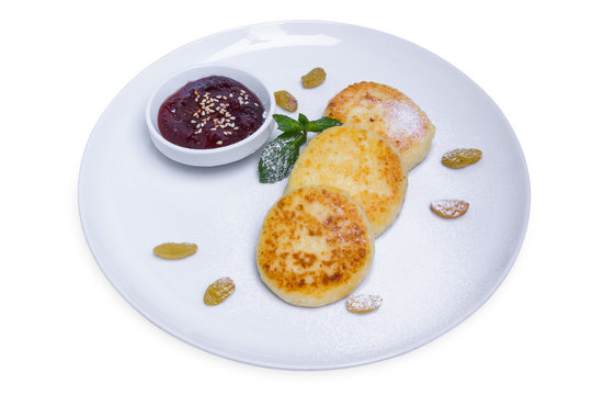 Cottage cheese pancakes with jam, isolated with clipping path