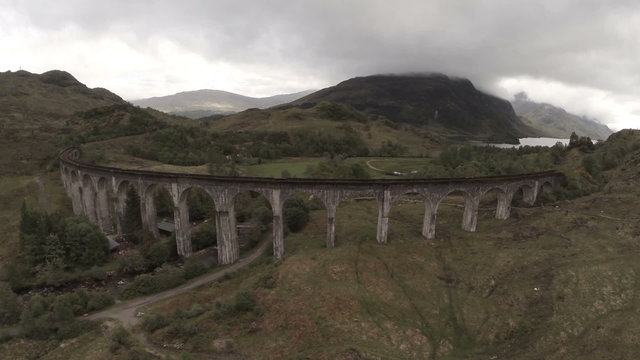 Aerial shot over Glenfinnan Viaduct in the Scottish Highlands 

