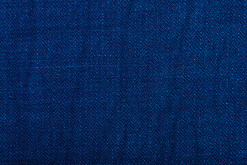 Blue cotton fabric wallpaper texture background, Colorful Thailand style rug surface, Close up fabric is made of hand-woven cotton fabric

