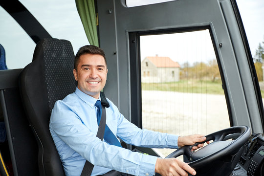 happy driver driving intercity bus