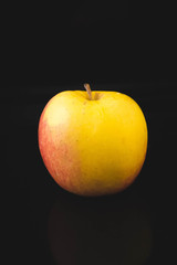 apple on a black background