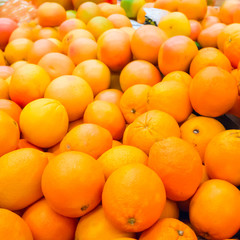 Pile of fresh oranges and mandarins