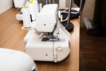Detail of sewing machine and sewing accessories.