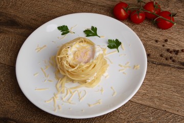 Fettuccini, egg, cheese and tomatoes