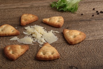 Homemade cheese cookies wooden table