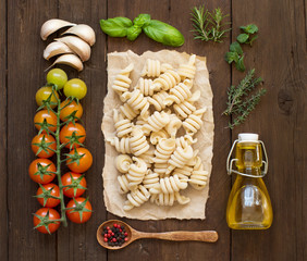 Italian pasta, vegetables,  herbs and olive oil