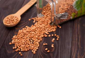 soya beans scattered on the wooden table