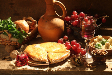 Red wine submitted with fruit and a cheese pie