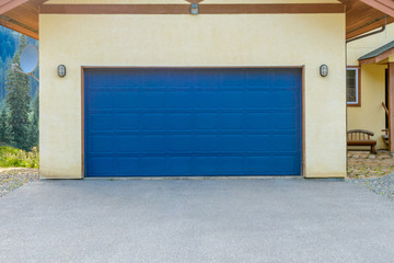 Fototapeta premium Fragment of a luxury house with a double garage door in Vancouver, Canada.