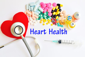 Heart, drugs, syringe and stethoscope, Heart disease concept
