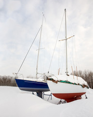 Obraz premium Two Sailboats in Winter
