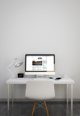 clean workspace with news website on computer screen
