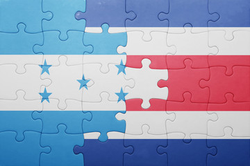 puzzle with the national flag of costa rica and honduras