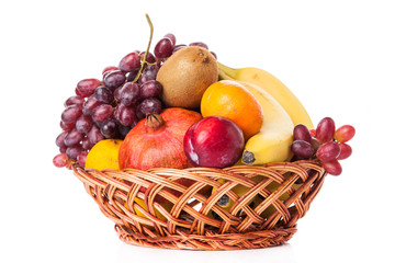 Fruits  in the basket. assorted fruits in wicker basket