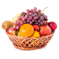 Naklejka na ściany i meble Fruits in the basket. assorted fruits in wicker basket