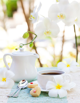 Romantic breakfast concept Cup of coffee with sugar icing decorated heart shaped cookies. Cheerful romantic morning