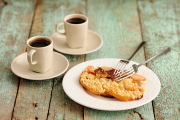 Homemade quince crumble pie and coffee