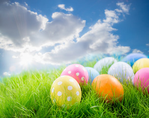 Colorful Easter eggs in grass