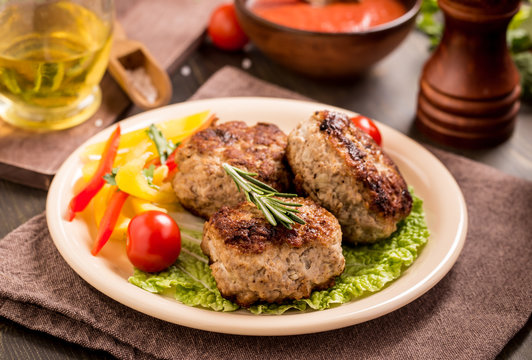 Meat cutlets on plate