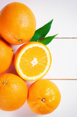 Orange fruit on white table