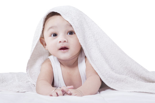 Baby Crawling under A Towel