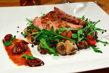 Delicious beef meat with lentils and with vegetables