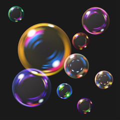 Multicolored transparent soap bubbles with glares. Transparency only in vector format