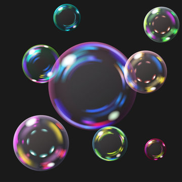 Multicolored transparent soap bubbles with glares. Transparency only in vector format