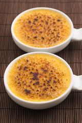 Creme brulee.French vanilla cream dessert with caramelised sugar