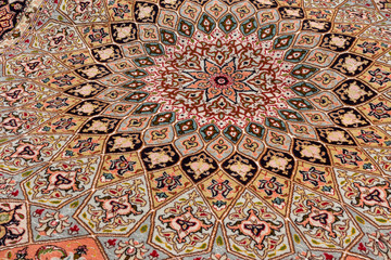 Close up of a very fine persian Gonbad Tabriz oriental carpet
