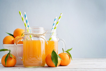Naklejka na ściany i meble Citrus juice in jar