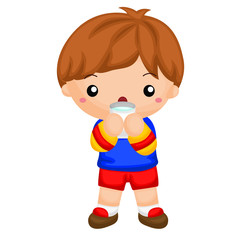 Boy drinking a glass of milk