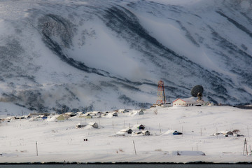 house covered with snow in the Russian town of Severo-Kurilsk on the Kuril Islands