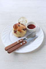 Strawberry jam with walnut and chocolate chip muffins.