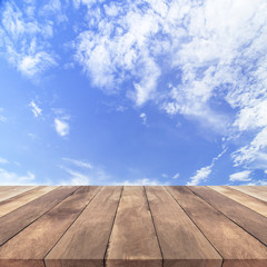 Wood table top on blue sky background - used for display your products