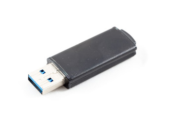 USB flash drive on a white background.